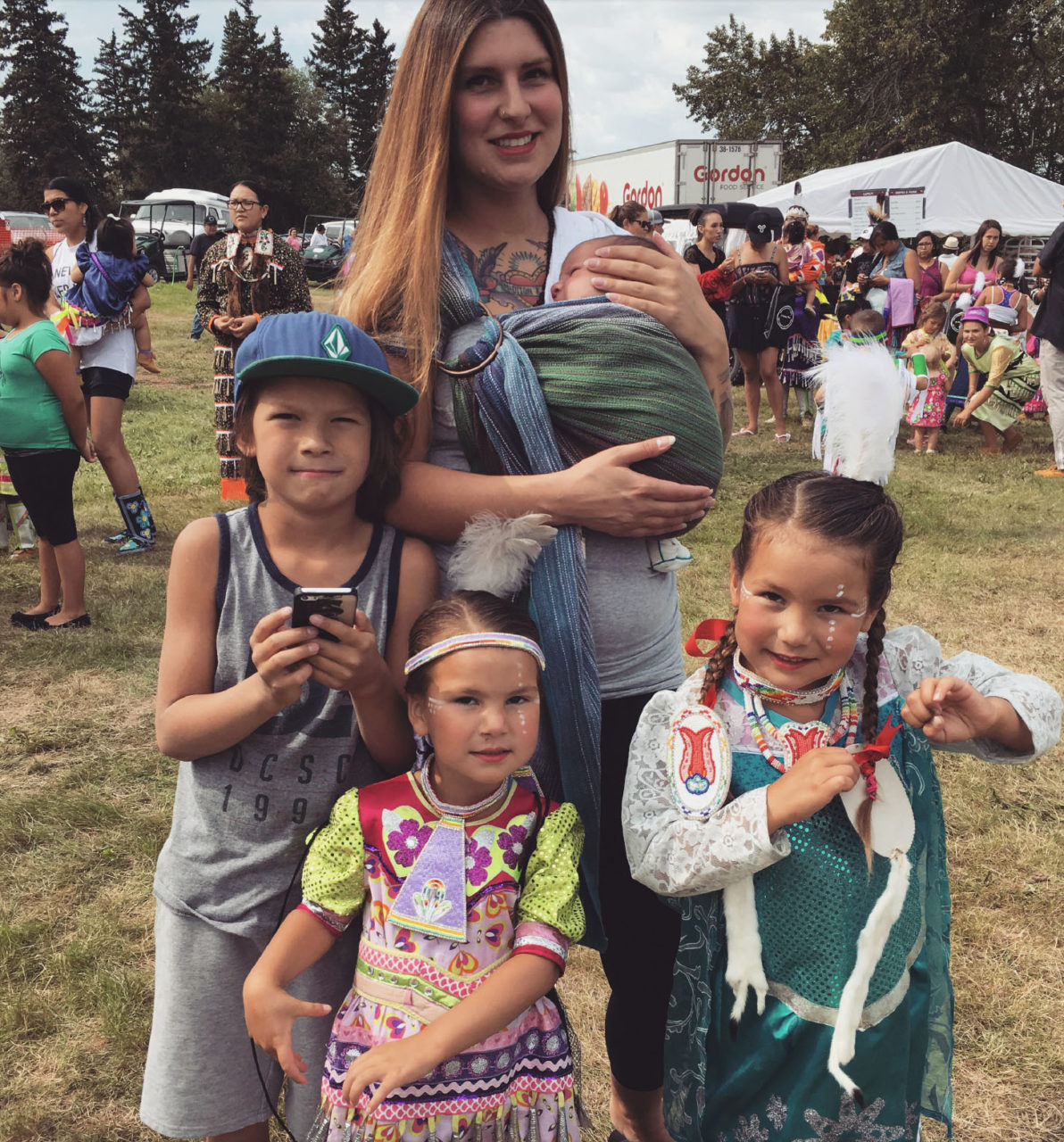 Young Indigenous family at Pow Wow