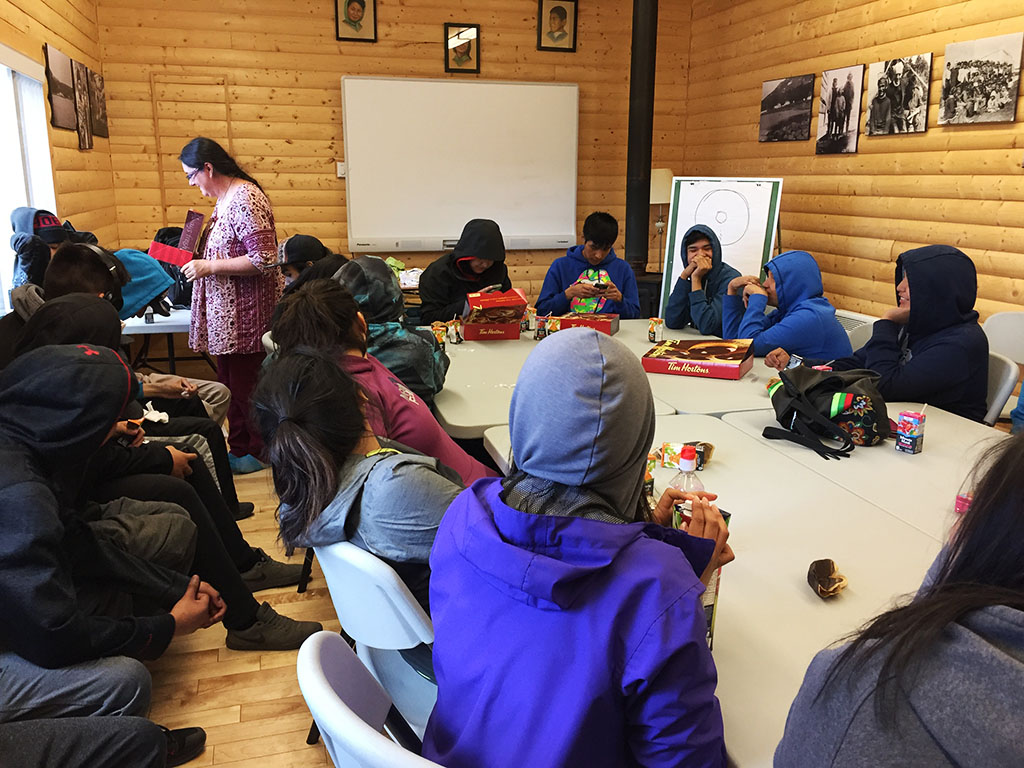 Carol Couchie gives workshop on reproductive health to teenagers in Natuashish, NL.