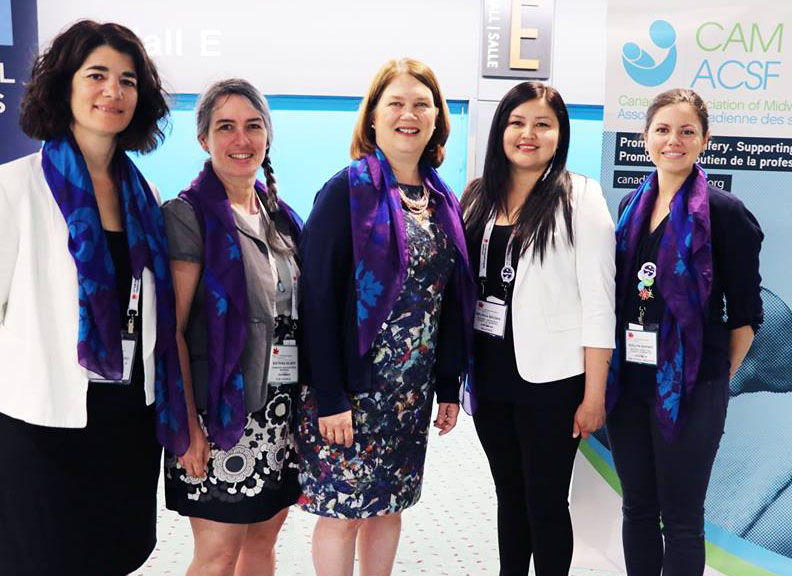CAM Executive Director, Tonia Occhionero, and CAM President Katrina Kilroy stand with then Minister of Health Jane Philpott and NACM Co‑Chairs Melissa Brown and Evelyn George (2017), while wearing the CAM/NACM scarf which represents the CAM‑NACM collaboration and serves as a commitment to this relationship into the future.